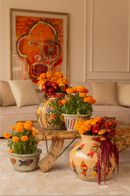 Maceta con flores de colores