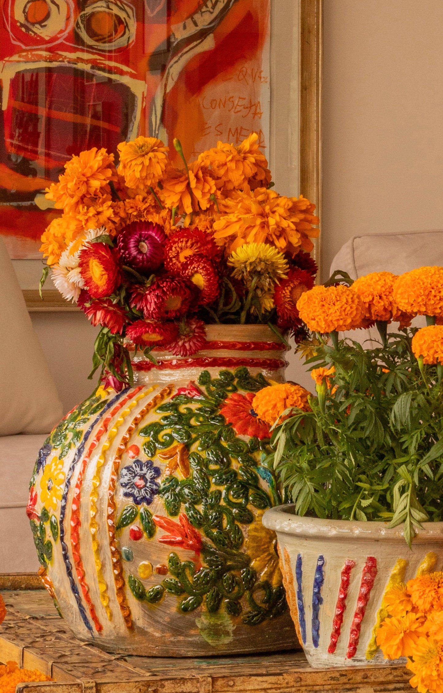 Maceta con flores de colores