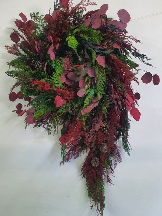 Corona con pino y hojas